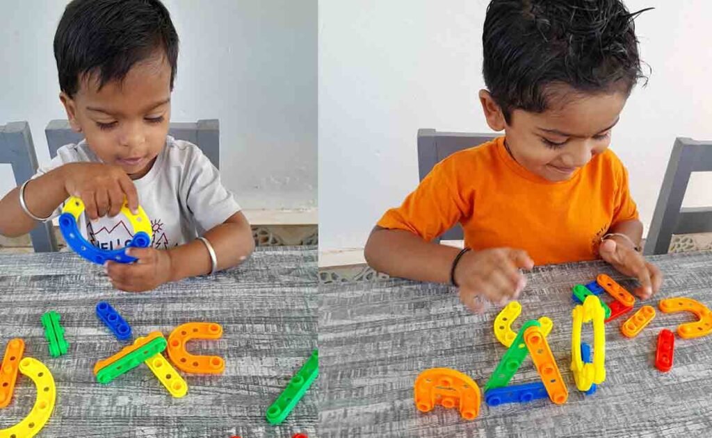 two boys learning shapes and colours